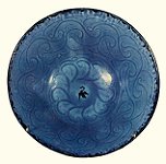 A blue plate from Gorgan, decorated with arabesque