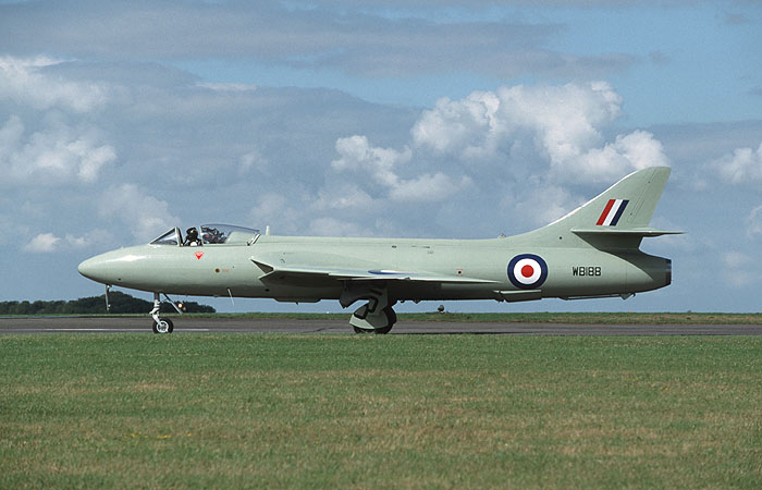 Hunter GA11 WV256/G-BZPB masquerading as prototype Hunter P.1067 WB188 cuts a fine outline as it taxies out for the finale of the show, the mass fly-past. The aircraft, an ex-FRADU machine, had its nose light removed and the standard rounded nose fitted especially for the event, as well as a new paint job of course. The result was truly magnificent.