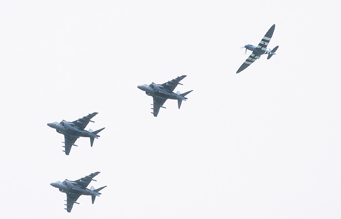 Three Cottesmore Harriers and Rolls-Royce's Spitfire