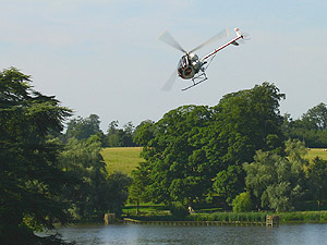 Dennis Kenyon and his Hughes 300C