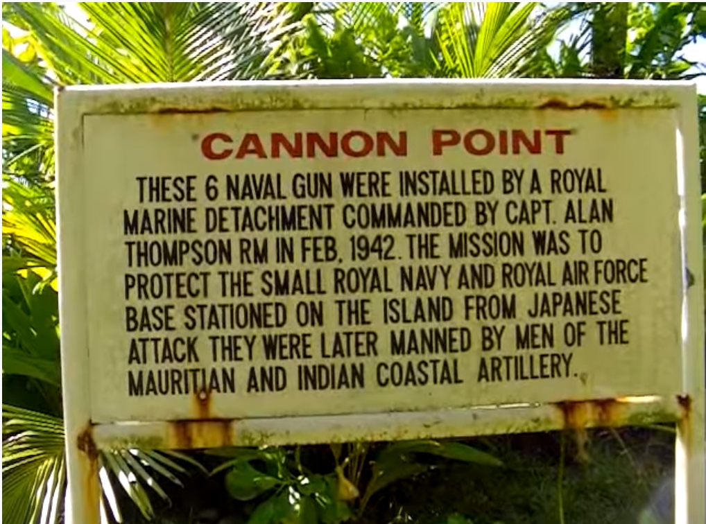 Sign commemorating the guns installed by the Royal Marines at Cannon Point, Diego Garcia.
